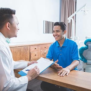 patient talking to dentist about sleep apnea 